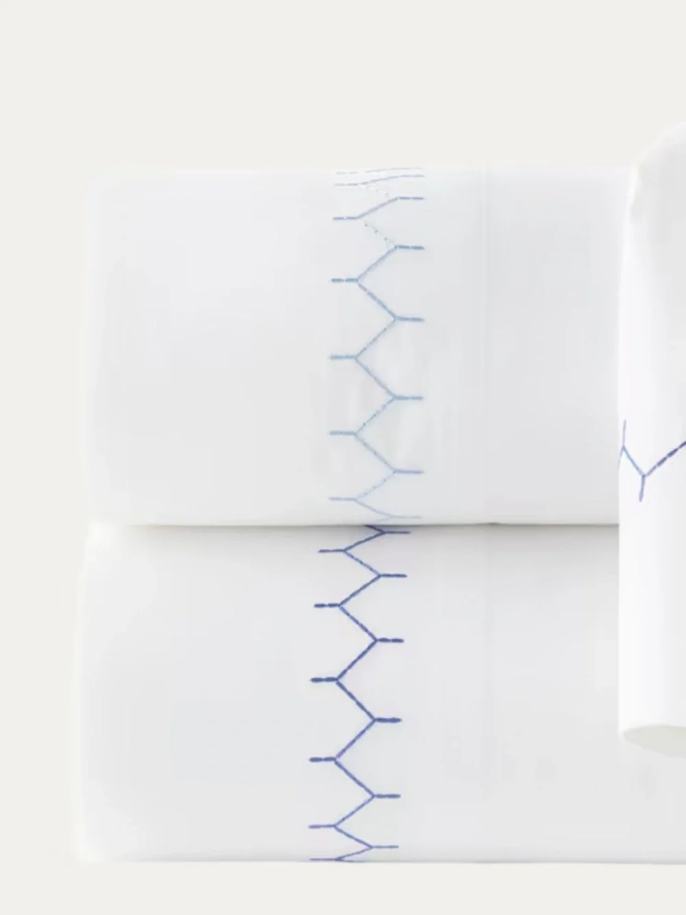 White twin sheet with Navy Embroidery